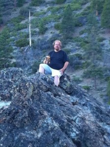 Standing on top of a huge rock rock picture